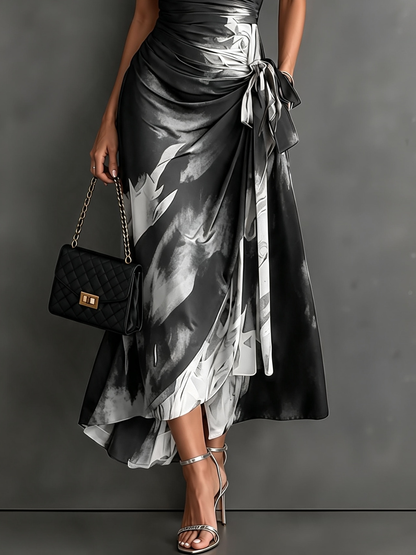 Red and Black Abstract Print Midi Dress with Collared V-Neck, Short Sleeves, Tie Waist, and Ruffled High-Low Hem